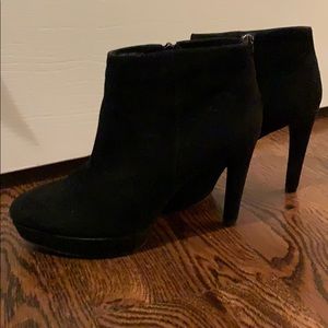 Black suede bootie with small platform and 4” heel